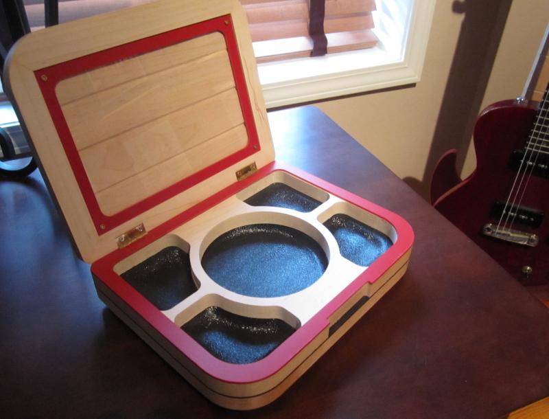 Picture frame on inside lid, vacuum formed tray compartments